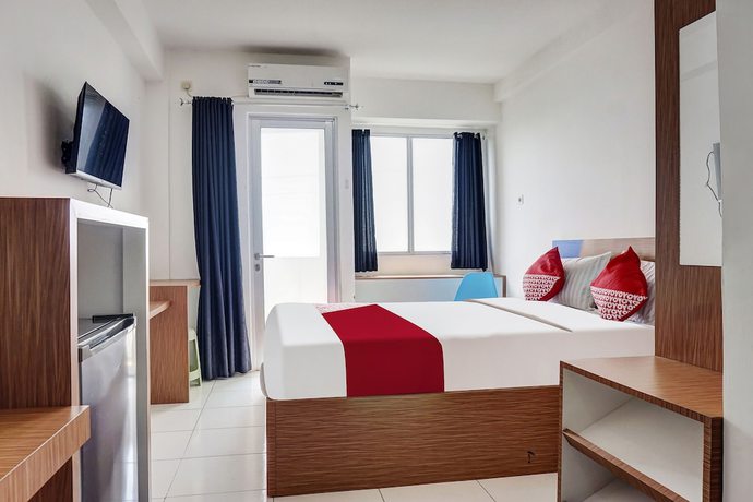 Imagen de la habitación del Hotel OYO 91045 Tower Mahakam By Toha Room. Foto 5