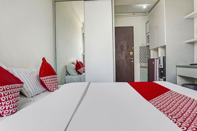 Imagen de la habitación del Hotel OYO 91045 Tower Mahakam By Toha Room. Foto 6