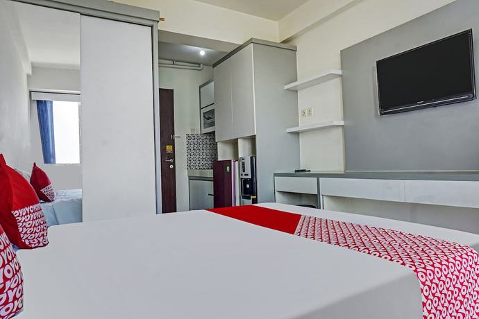Imagen de la habitación del Hotel OYO 91045 Tower Mahakam By Toha Room. Foto 7