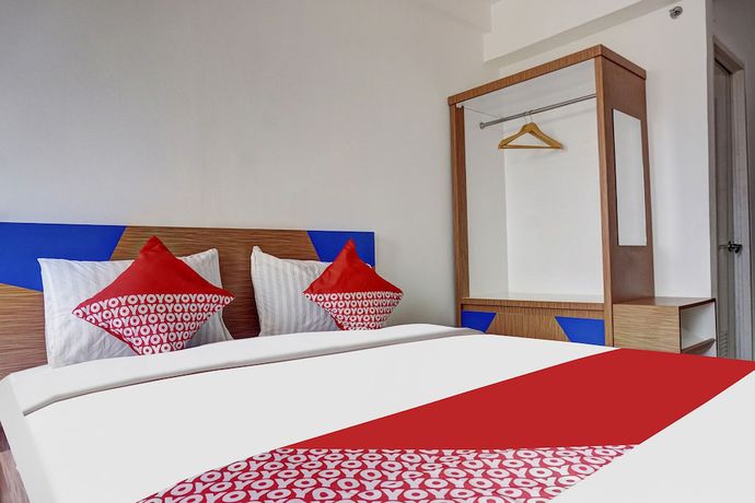 Imagen de la habitación del Hotel OYO 91045 Tower Mahakam By Toha Room. Foto 10