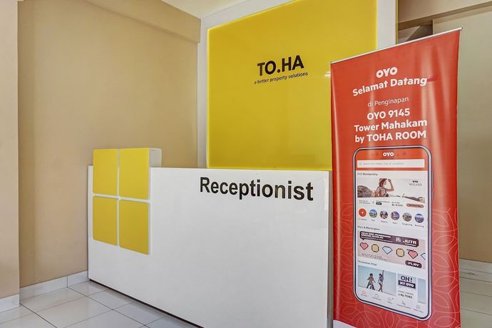 Imagen de los interiores del Hotel OYO 91045 Tower Mahakam By Toha Room. Foto 17