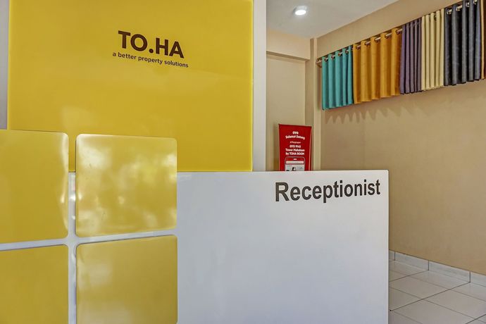 Imagen de los interiores del Hotel OYO 91045 Tower Mahakam By Toha Room. Foto 18