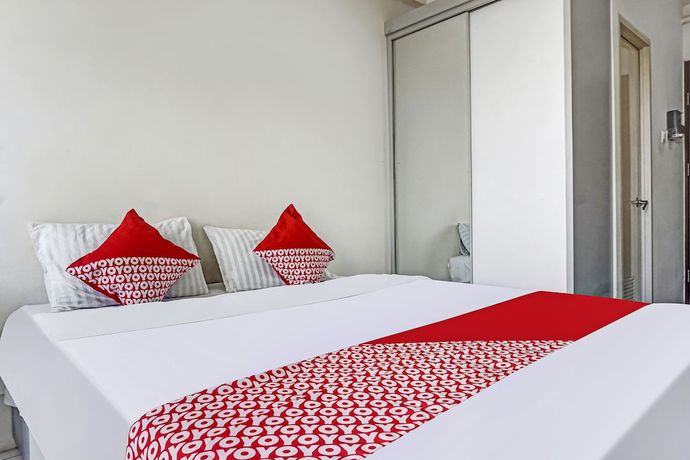 Imagen de la habitación del Hotel OYO 91045 Tower Mahakam By Toha Room. Foto 13