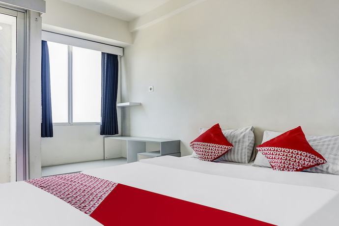 Imagen de la habitación del Hotel OYO 91045 Tower Mahakam By Toha Room. Foto 14