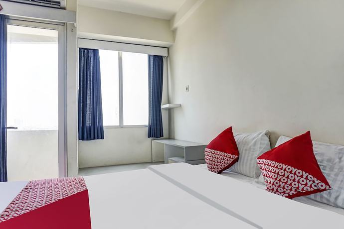 Imagen de la habitación del Hotel OYO 91045 Tower Mahakam By Toha Room. Foto 15