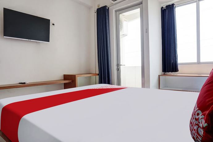 Imagen de la habitación del Hotel OYO 91045 Tower Mahakam By Toha Room. Foto 16