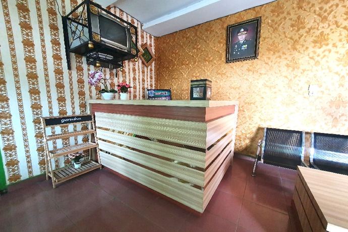 Imagen de los interiores del Hotel OYO 91077 Losmen Bunda Arema. Foto 16