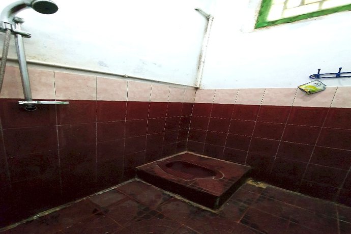 Imagen de la habitación del Hotel OYO 91077 Losmen Bunda Arema. Foto 10