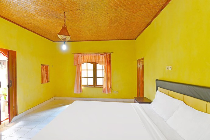 Imagen de la habitación del Hotel OYO 91100 Pondok Kusuma Wisata. Foto 2