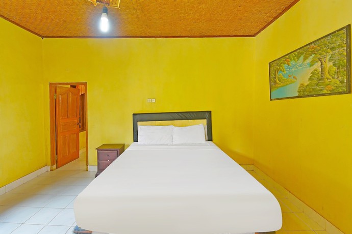 Imagen de la habitación del Hotel OYO 91100 Pondok Kusuma Wisata. Foto 3