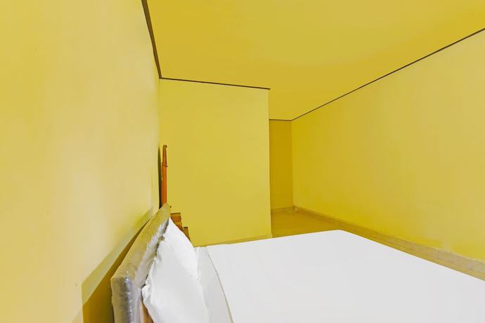 Imagen de la habitación del Hotel OYO 91100 Pondok Kusuma Wisata. Foto 4