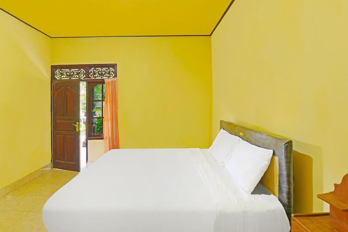 Imagen de la habitación del Hotel OYO 91100 Pondok Kusuma Wisata. Foto 5