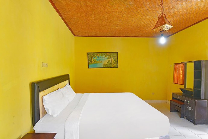 Imagen de la habitación del Hotel OYO 91100 Pondok Kusuma Wisata. Foto 7