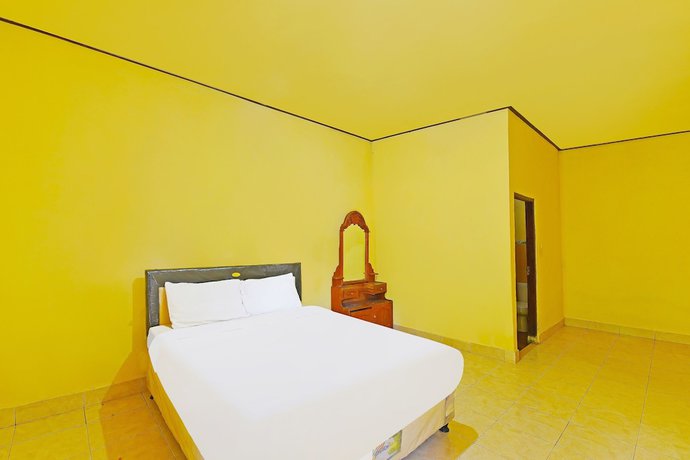 Imagen de la habitación del Hotel OYO 91100 Pondok Kusuma Wisata. Foto 9