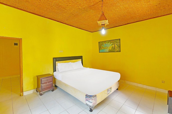 Imagen de la habitación del Hotel OYO 91100 Pondok Kusuma Wisata. Foto 10