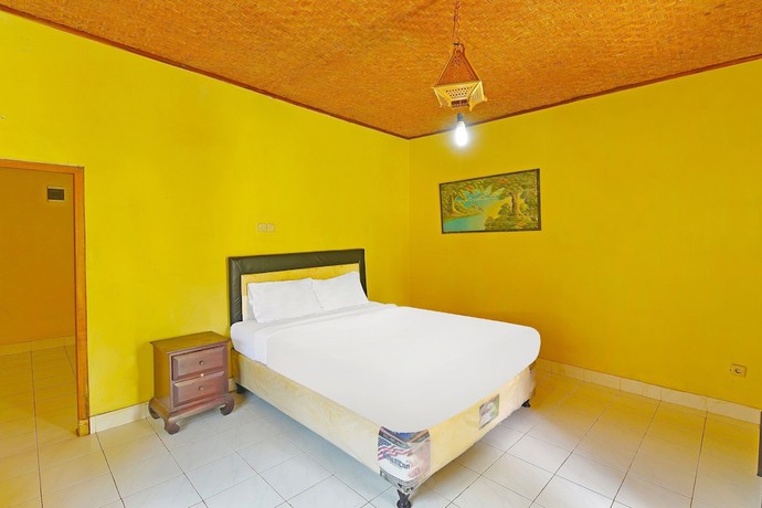 Imagen de la habitación del Hotel OYO 91100 Pondok Kusuma Wisata. Foto 11