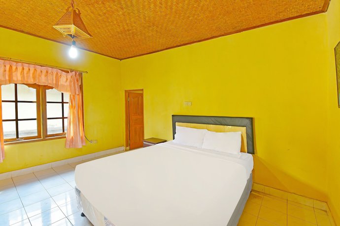 Imagen de la habitación del Hotel OYO 91100 Pondok Kusuma Wisata. Foto 12