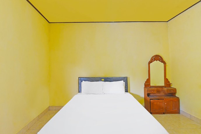 Imagen de la habitación del Hotel OYO 91100 Pondok Kusuma Wisata. Foto 14