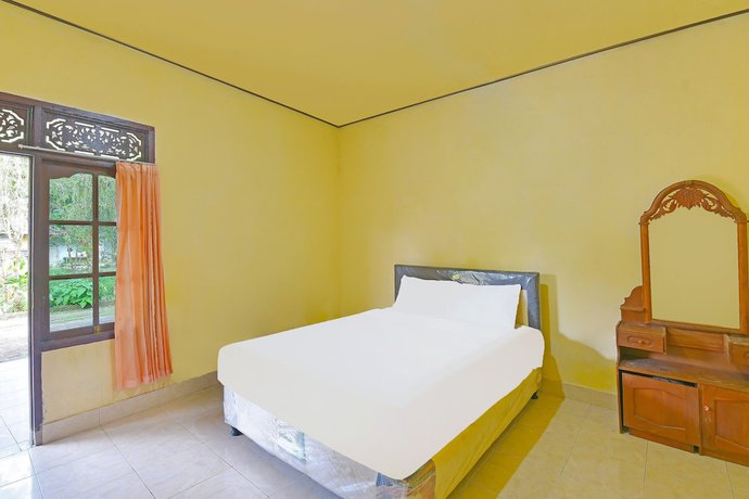 Imagen de la habitación del Hotel OYO 91100 Pondok Kusuma Wisata. Foto 15