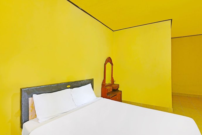 Imagen de la habitación del Hotel OYO 91100 Pondok Kusuma Wisata. Foto 16