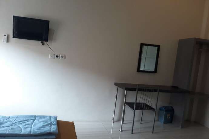 Imagen de la habitación del Hotel OYO 91162 Homestay Ansyariah Syariah. Foto 16