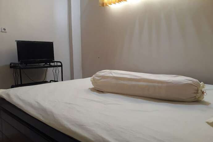 Imagen de la habitación del Hotel OYO 91162 Homestay Ansyariah Syariah. Foto 18