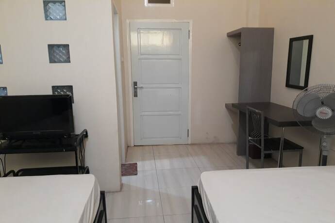 Imagen de la habitación del Hotel OYO 91162 Homestay Ansyariah Syariah. Foto 19