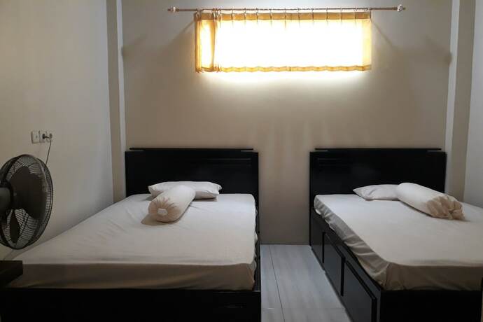 Imagen de la habitación del Hotel OYO 91162 Homestay Ansyariah Syariah. Foto 20