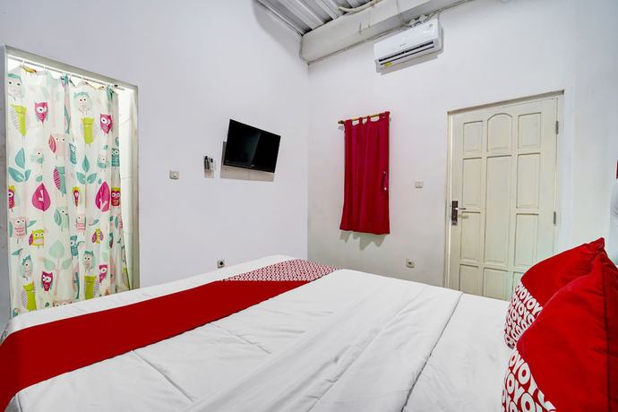 Imagen de la habitación del Hotel OYO 91173 Guesthouse King Puntodewo. Foto 8