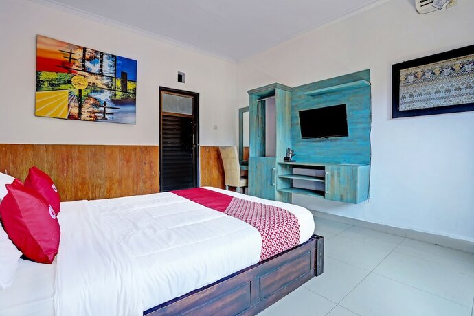 Imagen de la habitación del Hotel OYO 91204 Napura Homestay. Foto 18