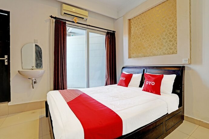 Imagen de la habitación del Hotel OYO 91204 Napura Homestay. Foto 19
