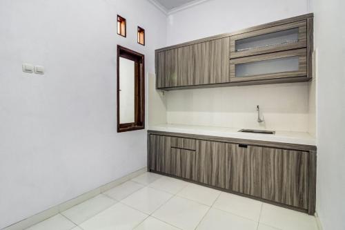 Imagen general del Hotel OYO 91243 Bina Syariah Guest House. Foto 11