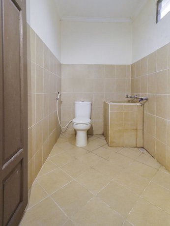 Imagen de la habitación del Hotel OYO 91262 Wisma Sido Moro. Foto 13