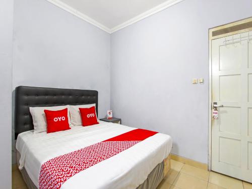 Imagen de la habitación del Hotel OYO 91315 Homestay Al Maidah. Foto 19