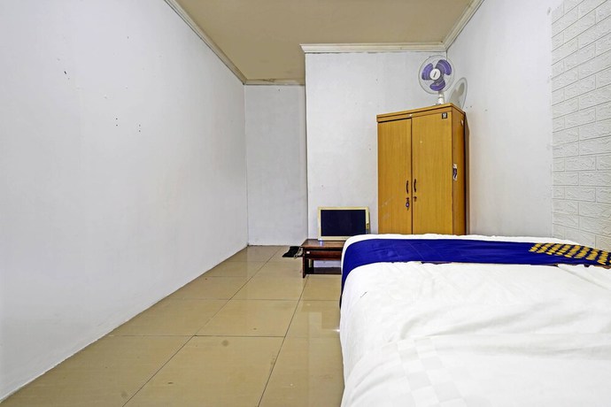 Imagen de la habitación del Hotel OYO 91330 City Munigar Residence Syariah. Foto 4