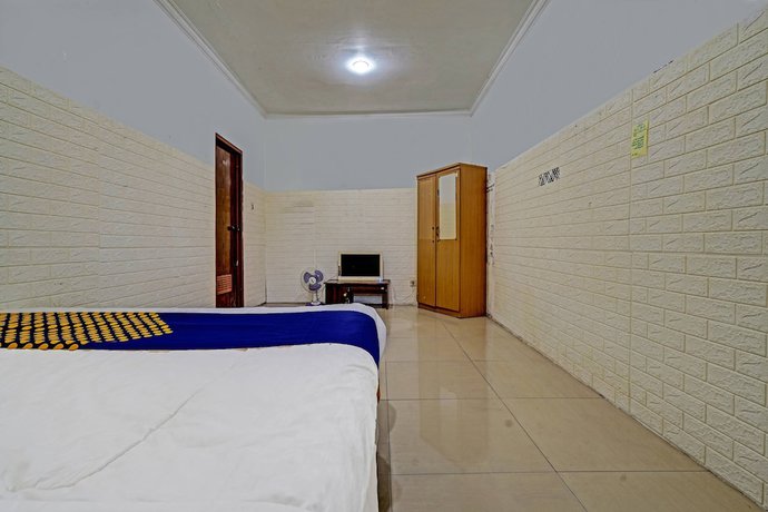 Imagen de la habitación del Hotel OYO 91330 City Munigar Residence Syariah. Foto 5