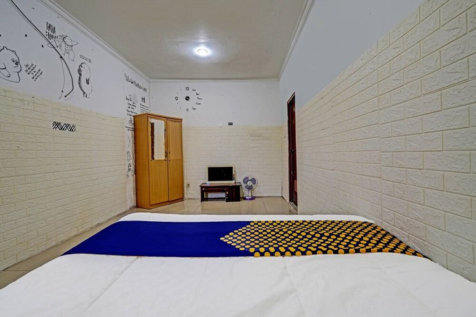 Imagen de la habitación del Hotel OYO 91330 City Munigar Residence Syariah. Foto 6