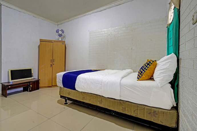 Imagen de la habitación del Hotel OYO 91330 City Munigar Residence Syariah. Foto 7