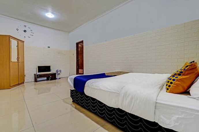 Imagen de la habitación del Hotel OYO 91330 City Munigar Residence Syariah. Foto 10
