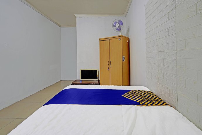 Imagen de la habitación del Hotel OYO 91330 City Munigar Residence Syariah. Foto 13