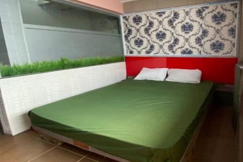 Imagen general del Hotel OYO 91340 Jenny Residence. Foto 12