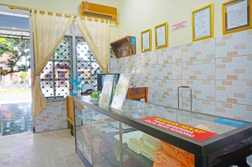 Imagen general del Hotel OYO 91411 Putih Mulia Homestay Syariah. Foto 4