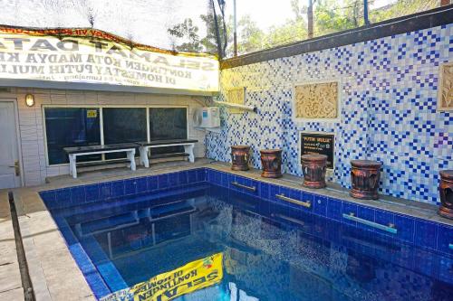 Imagen general del Hotel OYO 91411 Putih Mulia Homestay Syariah. Foto 7