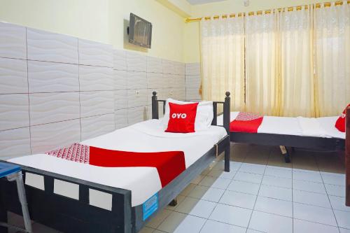 Imagen general del Hotel OYO 91411 Putih Mulia Homestay Syariah. Foto 15
