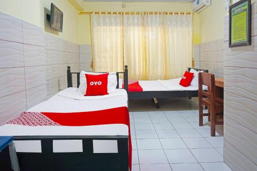 Imagen general del Hotel OYO 91411 Putih Mulia Homestay Syariah. Foto 16