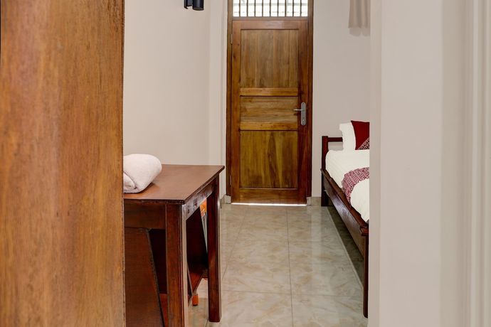 Imagen de la habitación del Hotel OYO 91419 Mulia Bangka. Foto 3