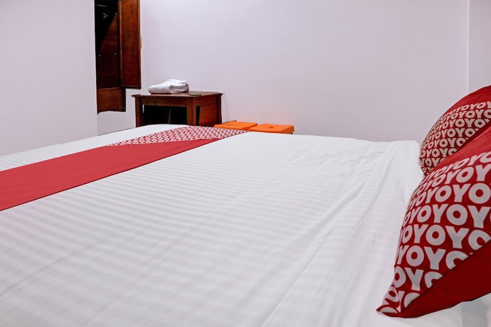 Imagen de la habitación del Hotel OYO 91419 Mulia Bangka. Foto 6