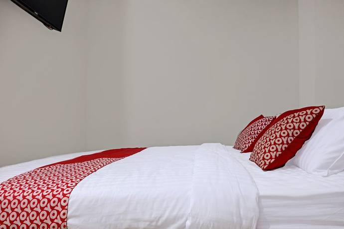 Imagen de la habitación del Hotel OYO 91419 Mulia Bangka. Foto 8