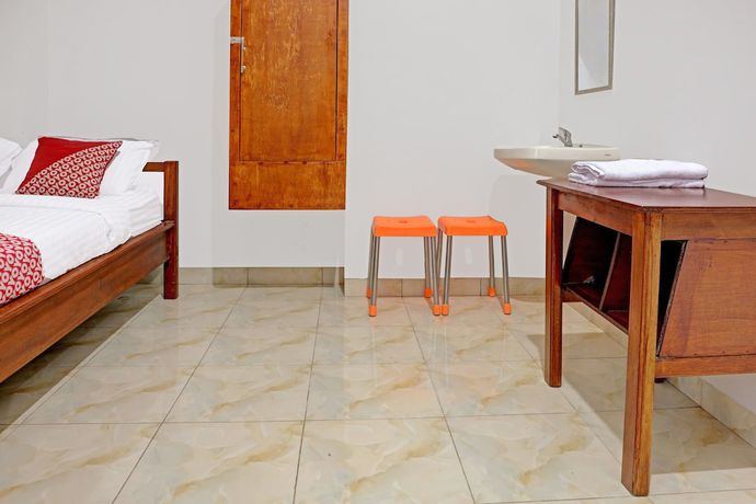 Imagen de la habitación del Hotel OYO 91419 Mulia Bangka. Foto 9