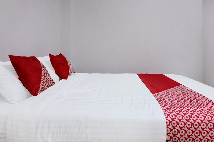 Imagen de la habitación del Hotel OYO 91419 Mulia Bangka. Foto 11